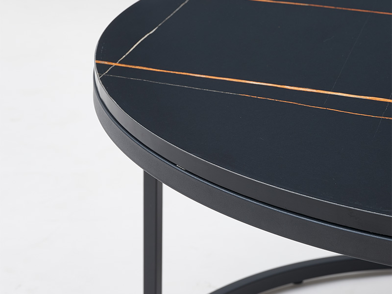 Black marble look sofa side tables melamine finish texture close up