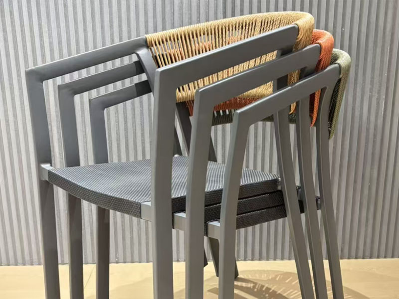 Perfect Stackpack design showing 25-high nesting stackable outdoor chairs to optimize ocean freight container loading and reduce B2B shipping costs.