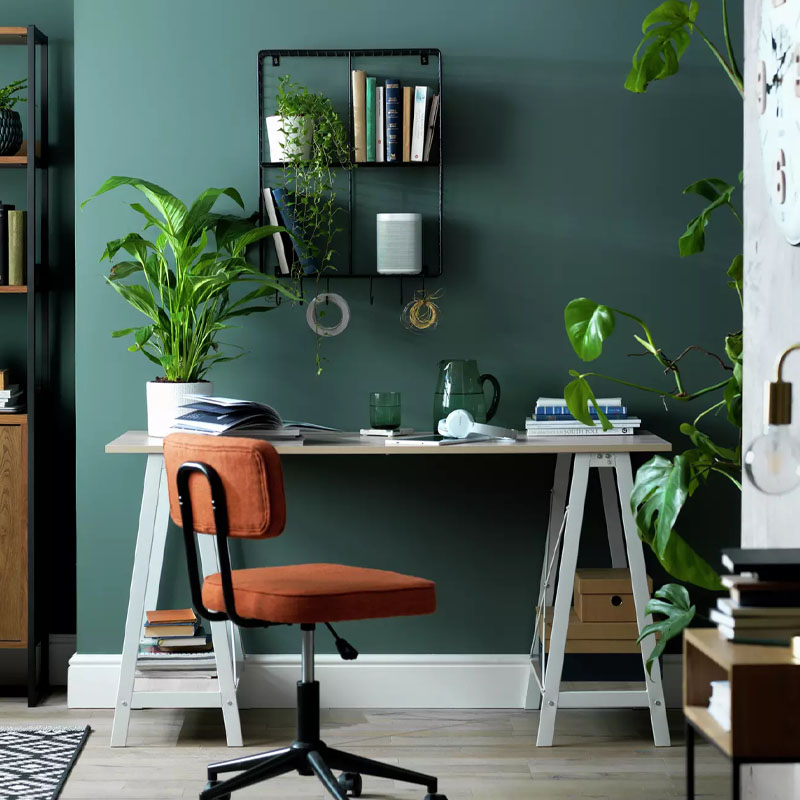 Contract furniture trestle workstation configuration deployed inside an urban minimalist co working hub layout
